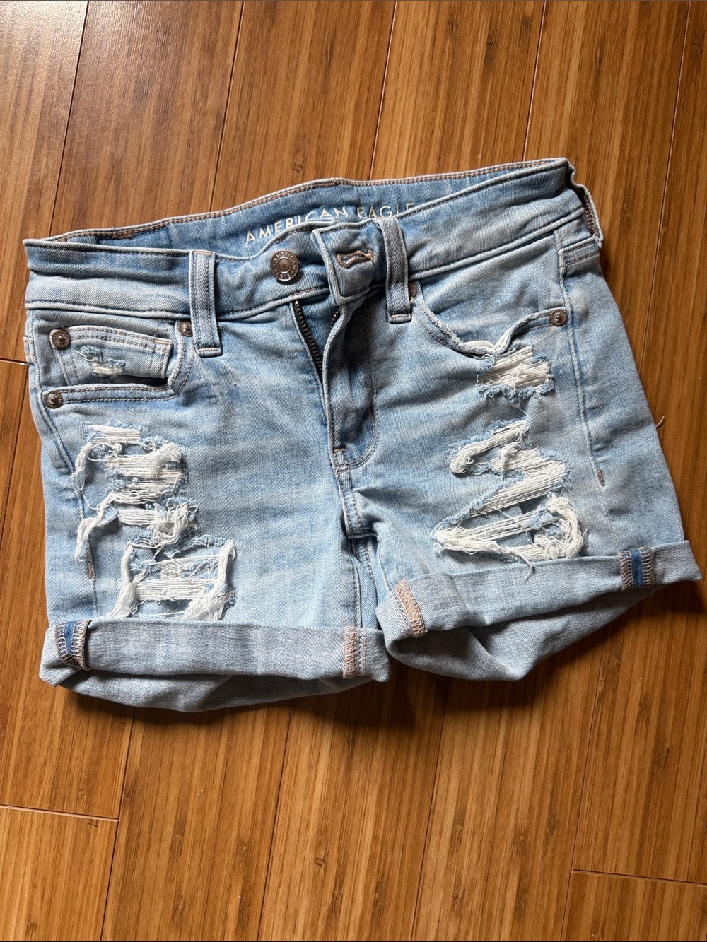 American Eagle Outfitters light wash distressed denim shorts